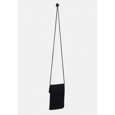 Karl Kani SIGNATURE POUCH BAG UNISEX - Across body bag - black